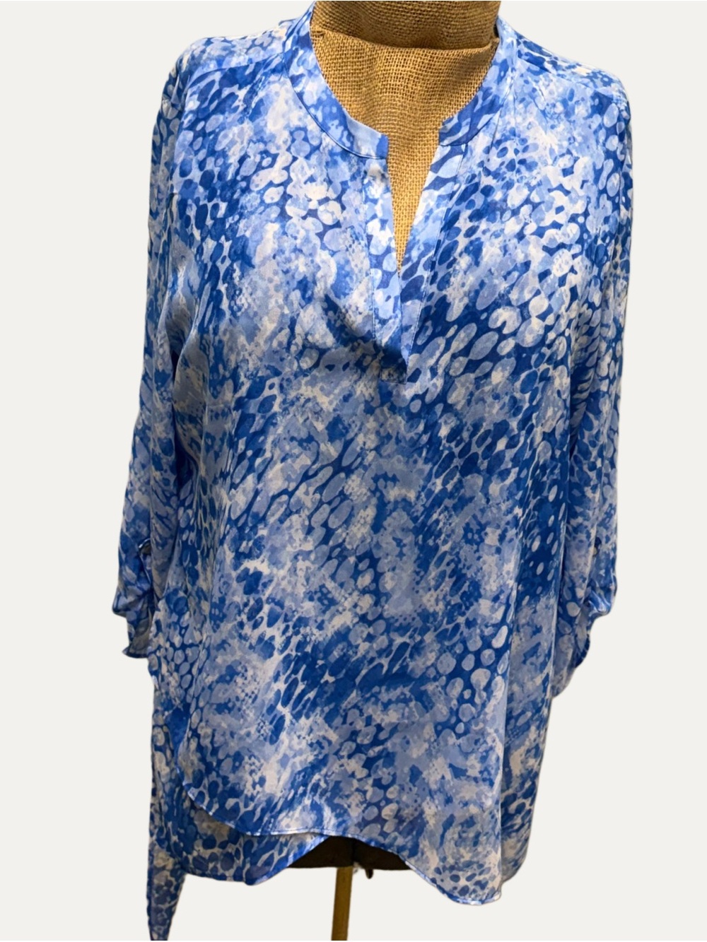 Chico’s Blue & white semi sheer asymmetrical top Chico’s size 2